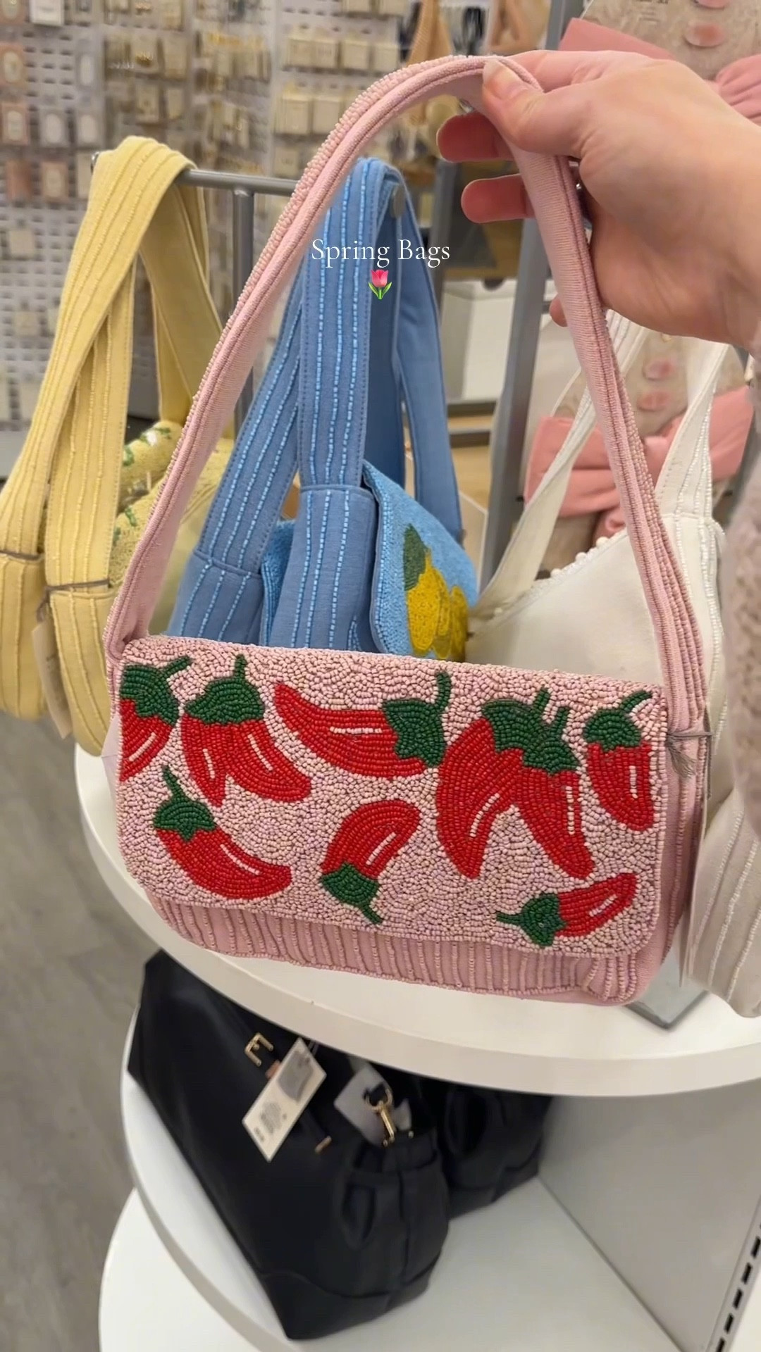 Pretty spring bags @Target 🌷🌸
The beaded bags have a lot of little details, and the pop out flowers are gorgeous in person!

🤍The pearlescent clutches are trending right now, and I understand why! There were only 3 left in my store! 
These are slim but can fit my phone and a few necessities. Perfect for a date night outfit, resort wear look, dinner out, vacation outfit, or cute girls get together look ✨

🔍 
New arrivals, trending bags, spring looks, spring purses, target finds, new spring outfits, accessories for spring outfits, florals, peppers, lemons, fruit purse, pearlescent purse, marble clutch, 2026 bags, budget friendly bags for 2026 


#LTKTravel #LTKSaleAlert #LTKSpringSale