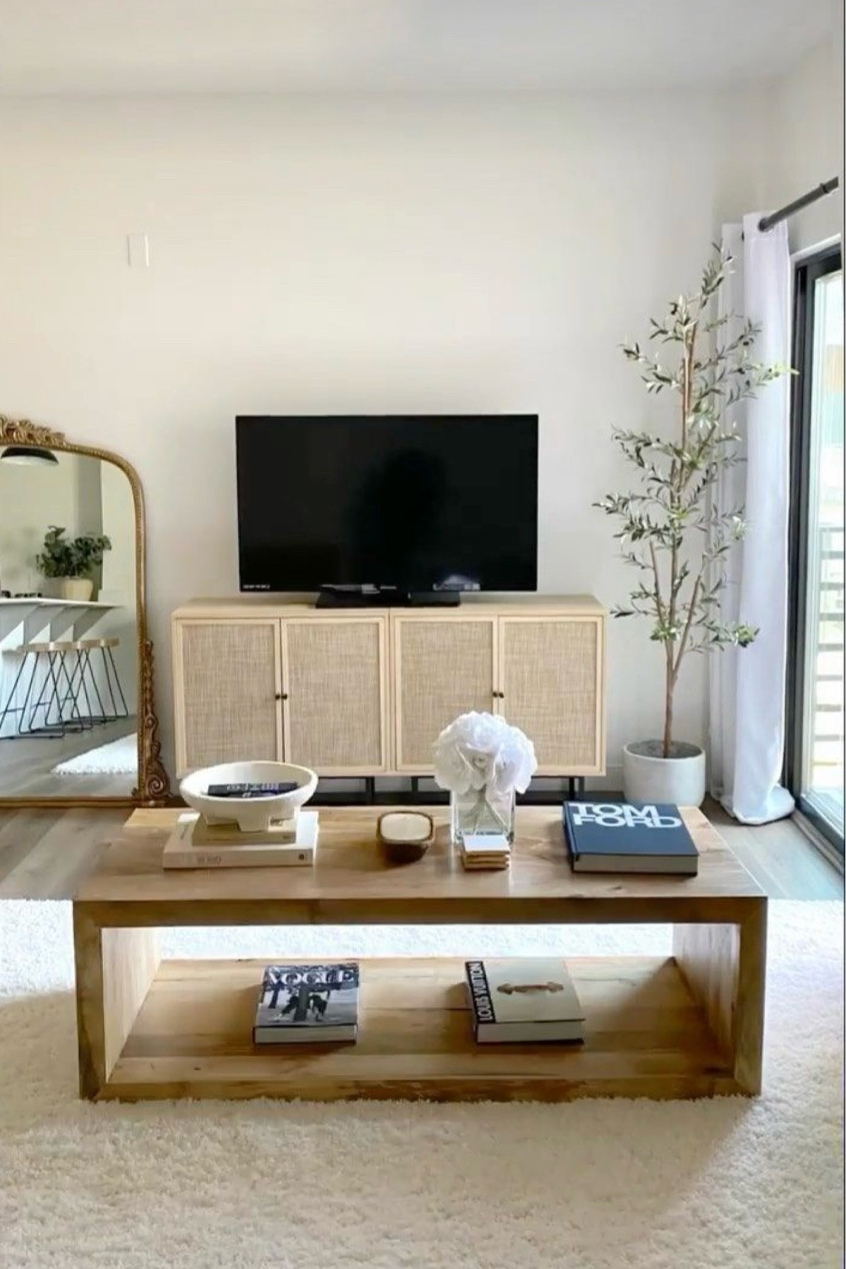 Love a natural wood and open coffee table! A great way to showcase your own personal tastes in art, decor, etc.

#LTKsalealert #LTKhome