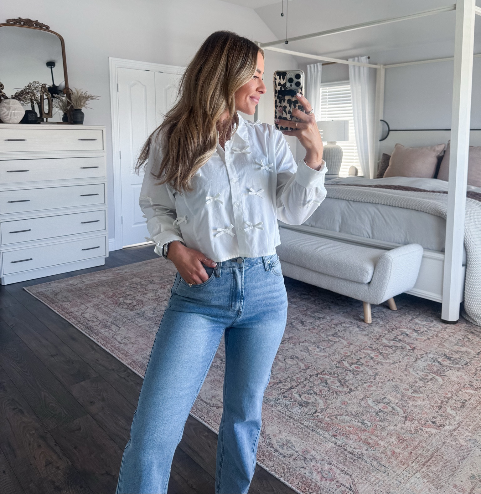 Medium in the top 
2 in the jeans 