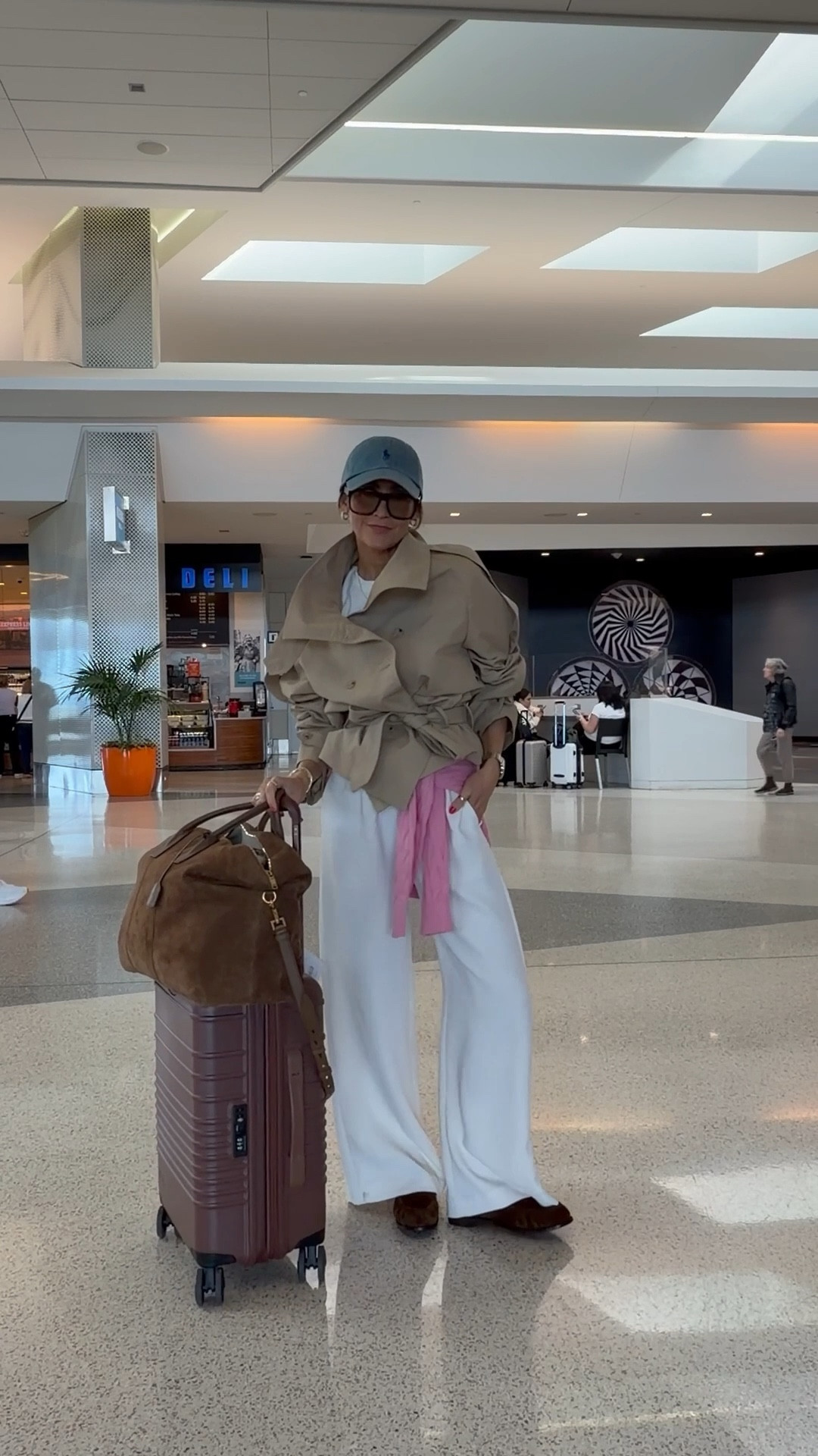 A few staples and pop of 💕 for our flight today! Comment AIRPORT OUTFIT and I’ll send you links to shop! 

Aritzia pull up pants, Zara oversized trench, TH cable knit sweater, oversized tee, Saint Laurent loafers, duffel bag, and sunnies. Ralph Lauren ball cap, chic airport outfit. 

#LTKgrwm #LTKTravel #LTKootd