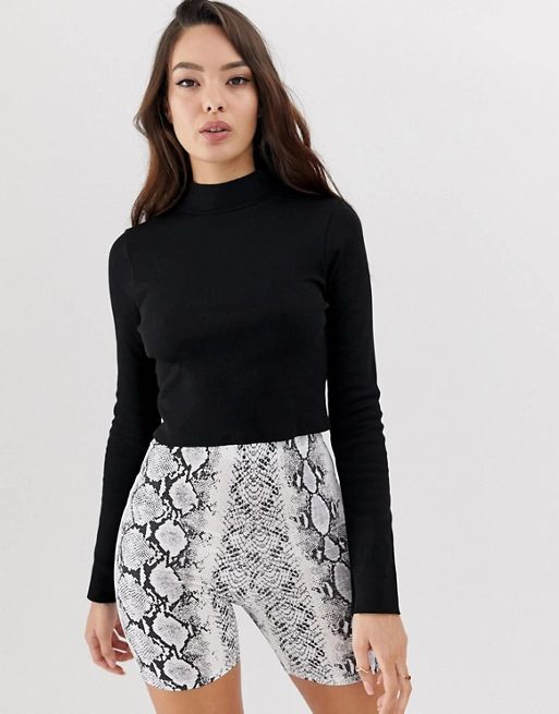 ASOS DESIGN long sleeve crop top with turtle neck and raw hem in rib in black | ASOS UK