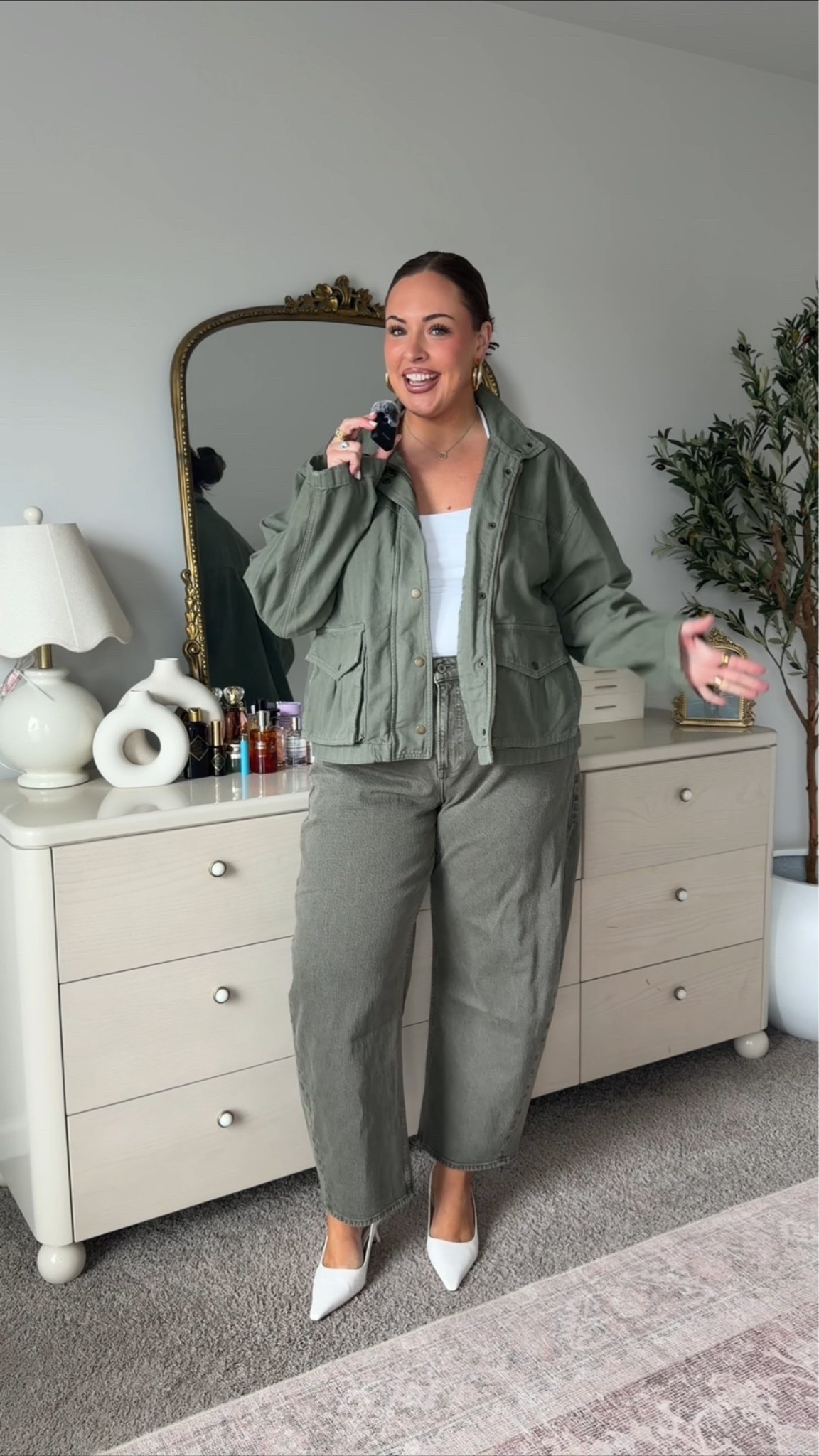 Wearing an xl jacket & tank & 34 jeans!