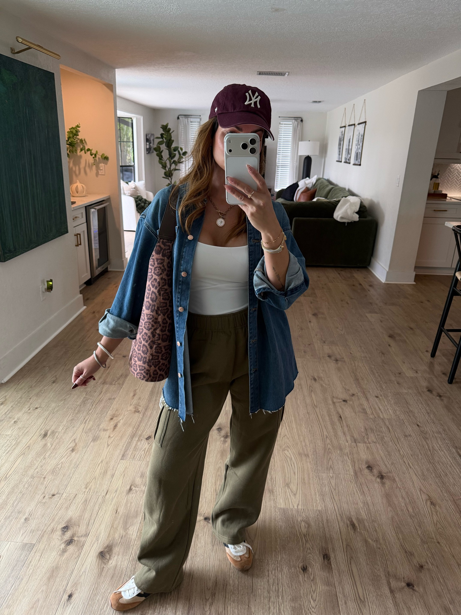 Another way to style these fleece cargo sweatpants from Amazon this fall! 

Wearing one of my favorite double layered tank tops paired with a denim button down shirt! 

Brought in more trending fall colorways with a burgundy hat and a leopard print bag. 

Everything is so affordable and versatile! Perfect for travel, everyday casual, school pickup, or running errands as a mom on the go!

#LTKootd #LTKTravel #LTKmomlife