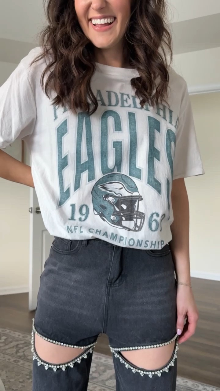 Super Bowl outfit with eagles oversized graphic t shirt + rhinestone black jeans with cut outs 

#LTKSeasonal #LTKWatchNow #LTKStyleTip