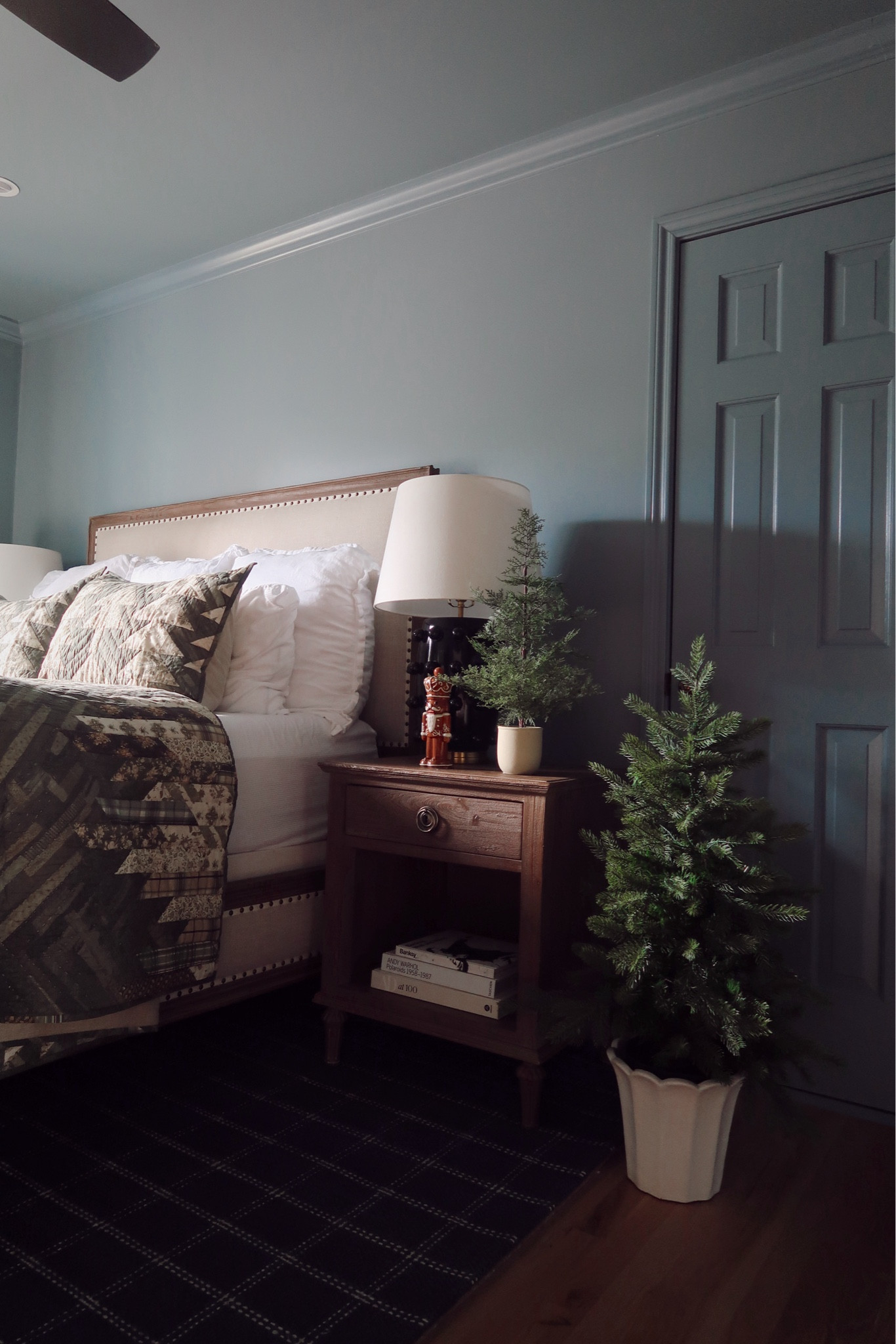 Creating a holiday retreat in the bedroom doesn’t have to be complicated. Start with warm, layered bedding in rich, timeless tones, and add a few small touches like a classic nutcracker or mini evergreen trees for understated charm. Soft textures and simple greenery bring that cozy holiday feel without overwhelming the space. A softly scented candle would be a perfect finishing touch. Who doesn’t love a little holiday spirit to unwind in? 🎄✨

home decor, holiday decor, bedroom decor, bedroom inspiration, classic holiday decor, pottery barn 