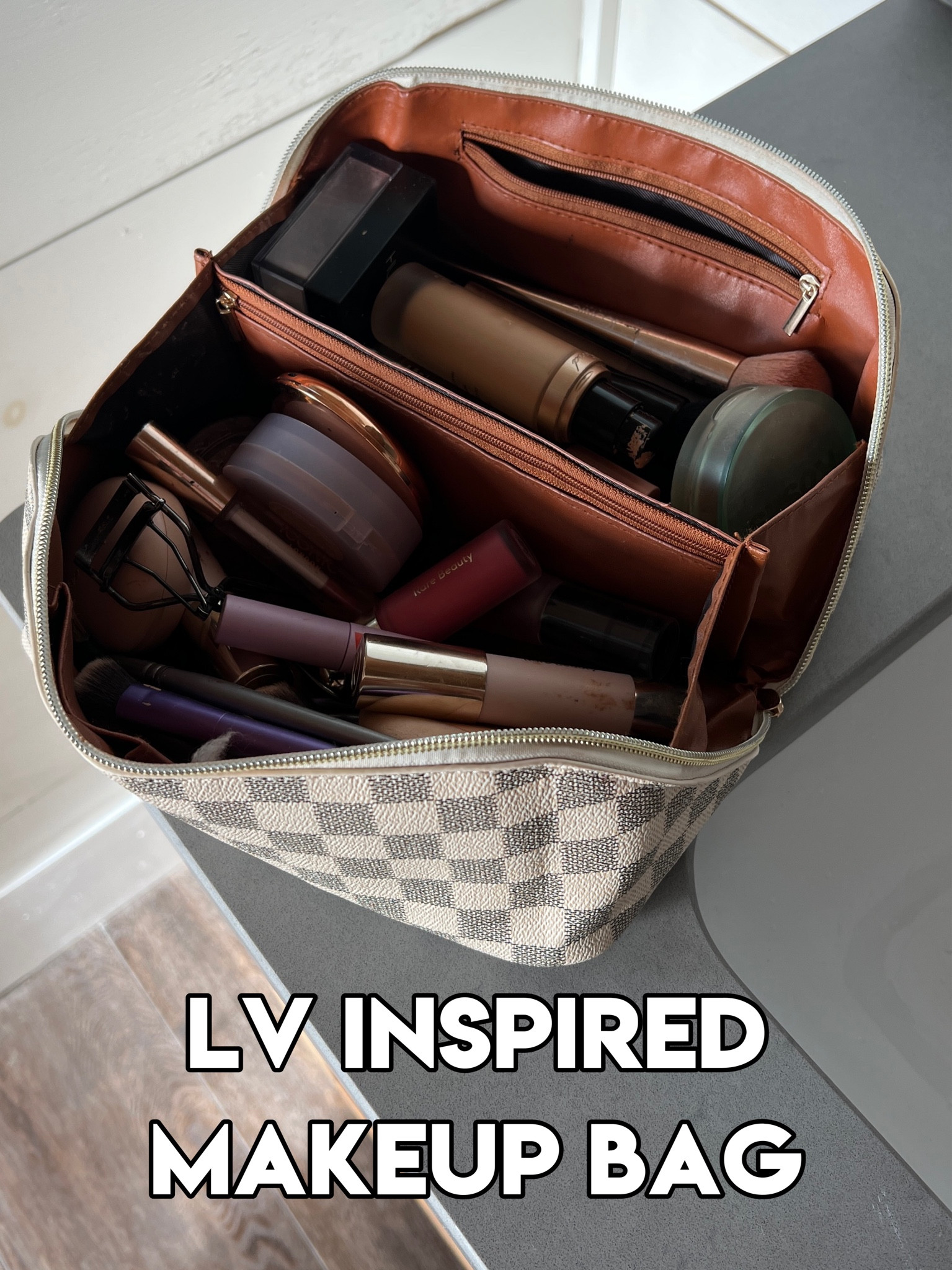 Louis Vuitton inspired makeup bag. 10/10. Quality is great and love the look - looks so much like LV! Holds all of my everyday makeup + brushes with extra storage and love that it has 2 separate sides. 🤌🏼 checkered makeup bag amazon prime designer inspired inspo dupe lookalike 


#LTKFind #LTKunder50 #LTKbeauty