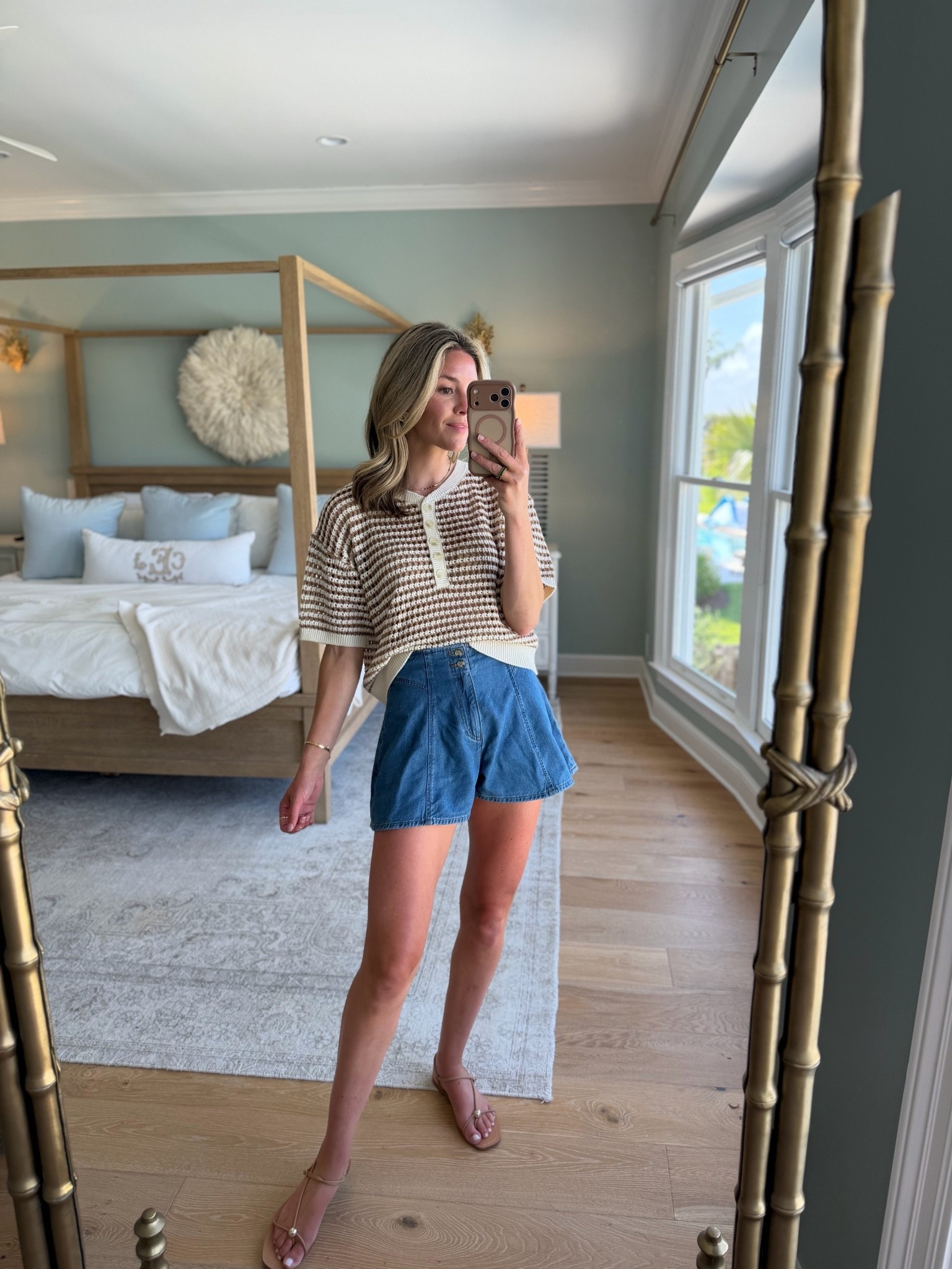 currently loving easy summer layers that feel equal parts classic and relaxed 🤍 this striped polo sweater and denim shorts combo is such a good everyday look for summer weekends, travel days, coffee runs, casual dinners, or those “throw something on but still look cute” moments.

finished it off with simple sandals and kept the styling minimal to let the textures and easy silhouette do the work. wearing a size small in the top and size 26 in the shorts. 

 #LTKootd #LTKSeasonal