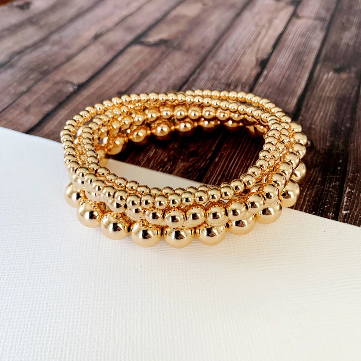 Boutique Bracelet Collection :: Nora Polished Gold Stacked Ball Bracelets | Baubles & Bits