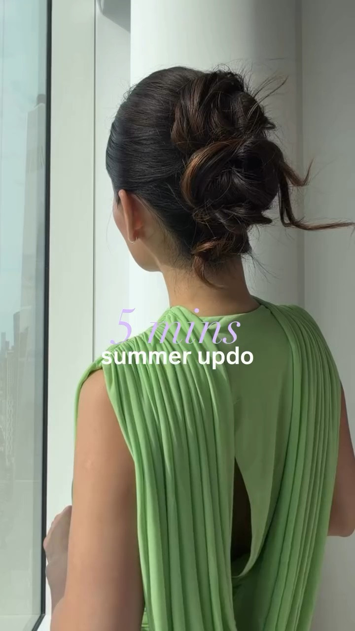 My go-to summer hairstyle when it’s too hot to wear my hair down. This easy updo has been my favorite for wedding guest hairstyles, outdoor events, date nights, and humid summer days.

1. Create two ponytails stacked on top of each other, but don’t pull the hair all the way through so it forms two loops.
2. Secure the loops with U-pins (I find they hold much better than bobby pins).
3. Twist the remaining ends, leave them slightly undone for a softer look, and tuck them underneath the buns.
4. Finish with a hair oil to smooth flyaways and a workable hairspray for hold without the crunch!