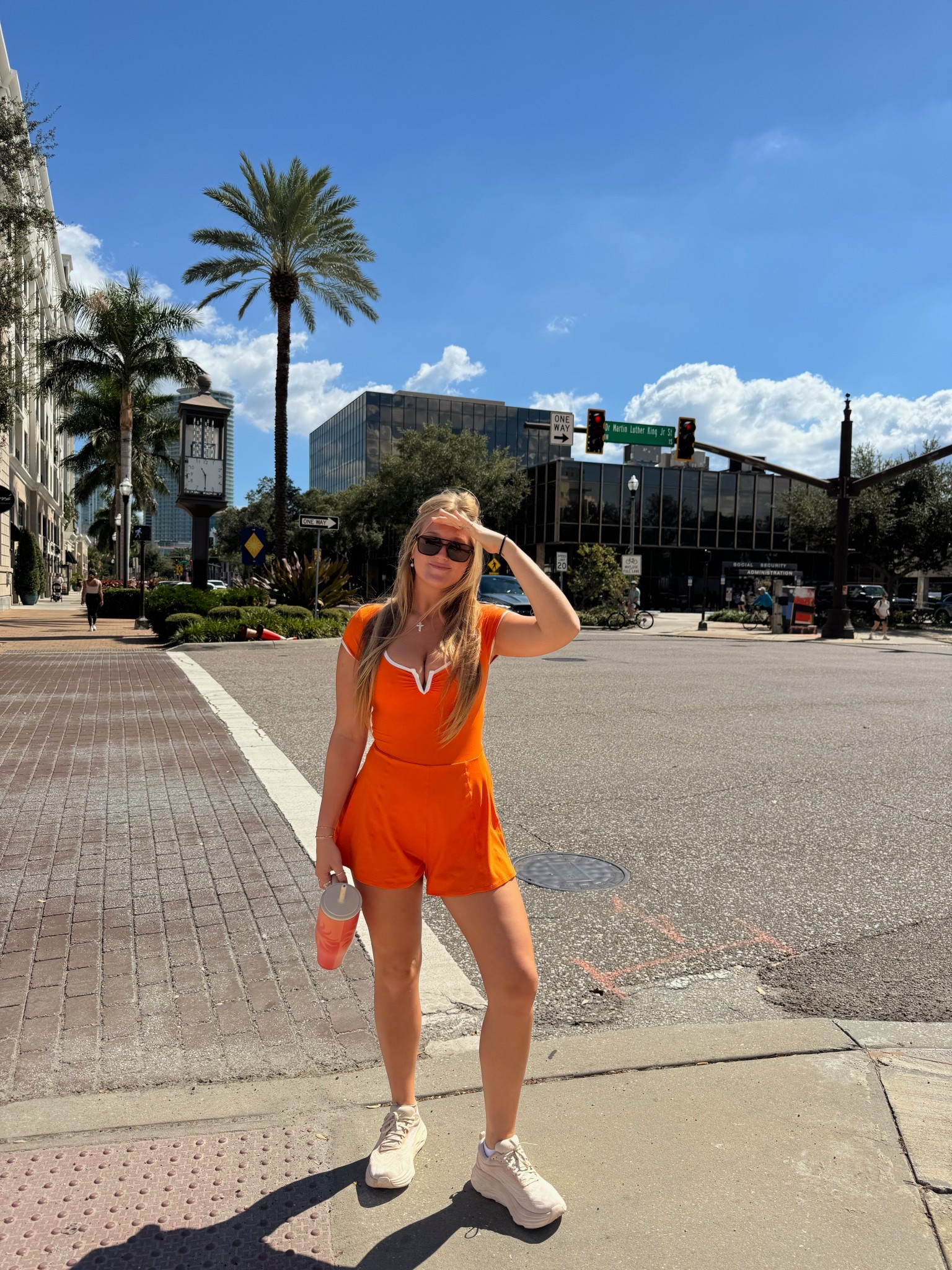 orange workout one piece 🧡 free people sale !! 

#LTKShoeCrush #LTKSaleAlert #LTKActive