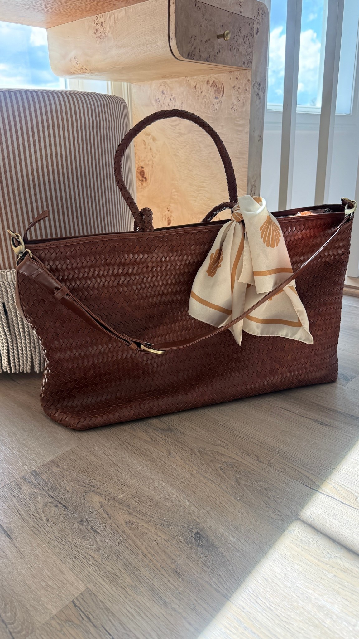 Loving this leather woven tote! 

#LTKootd #LTKSeasonal #LTKgrwm