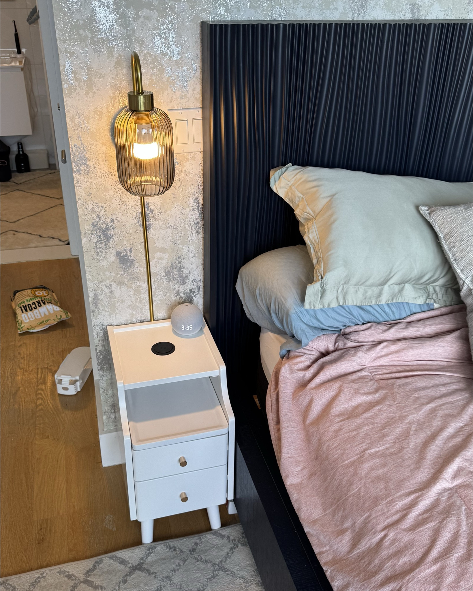 Thrilled with how our bedside area came out! We only had about a foot of space on either side of our new headboard, so went with narrow nightstands (that have built-in charging and a surprising amount of storage) and wall-mounted bedside lamps to maximize the space. 

Thinking about replacing the drawer knobs with true gold ones that are more unique!



#LTKHome #LTKFindsUnder100 #LTKSaleAlert