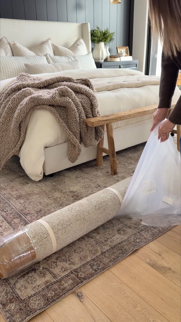 Our bedroom feels instantly warmer with the new Mabel rug from Quince.
