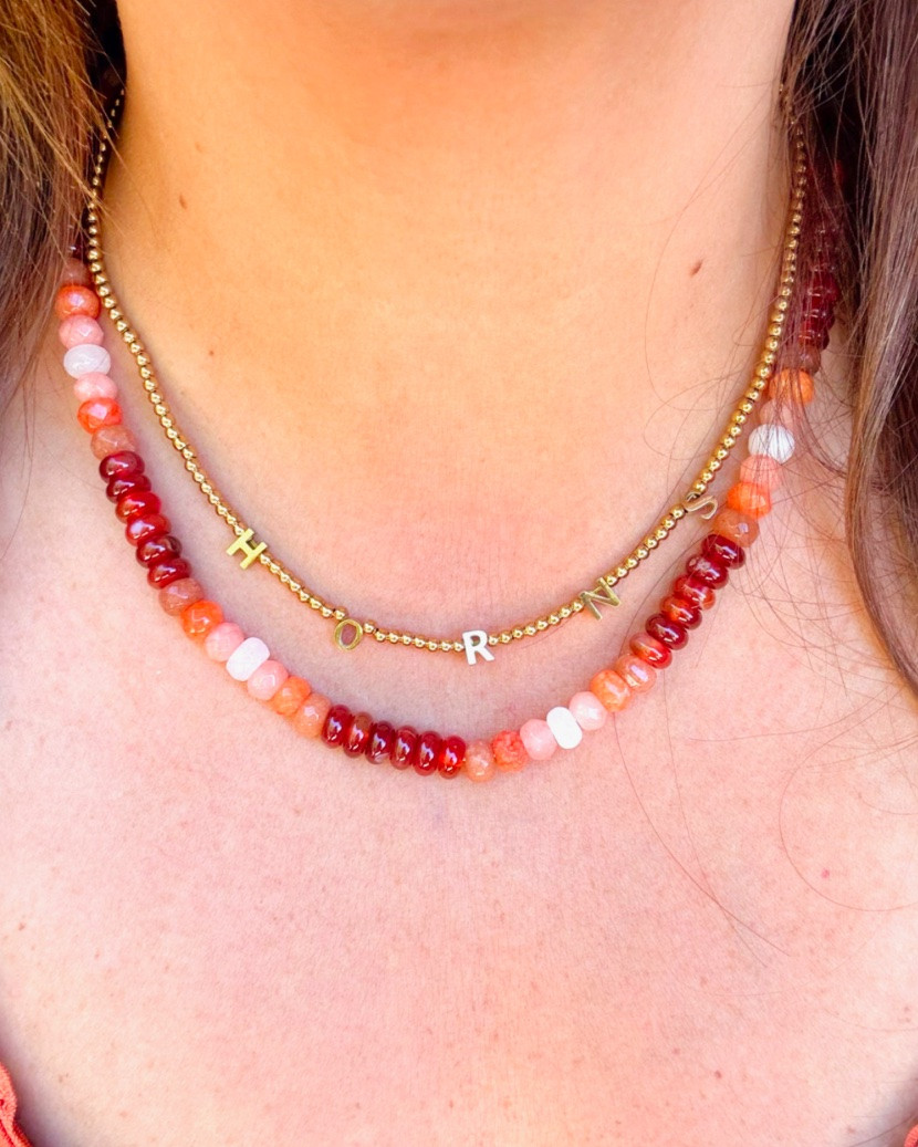 ⁠the $78 burnt orange gemstone necklace by @goldenthreadinc is still one of my favorites! 🧡