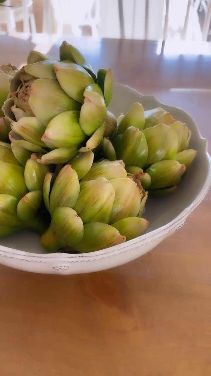 Kitchen table decor - fruit bowl with faux artichokes. 

#LTKhome #LTKSeasonal