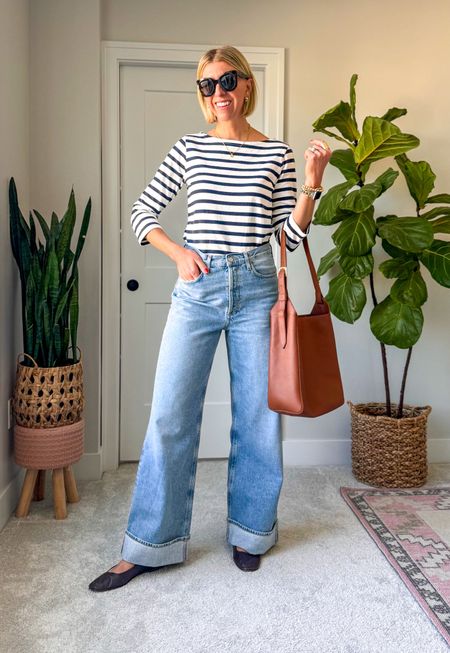 How to style cuffed wide leg jeans over 40! Pair with a fitted top, ballet flats + handbag 

I’m 5’10” for height reference & wearing my tts 27 in these amazing jeans👏🏻

#LTKover40 #LTKstyletip #LTKSeasonal