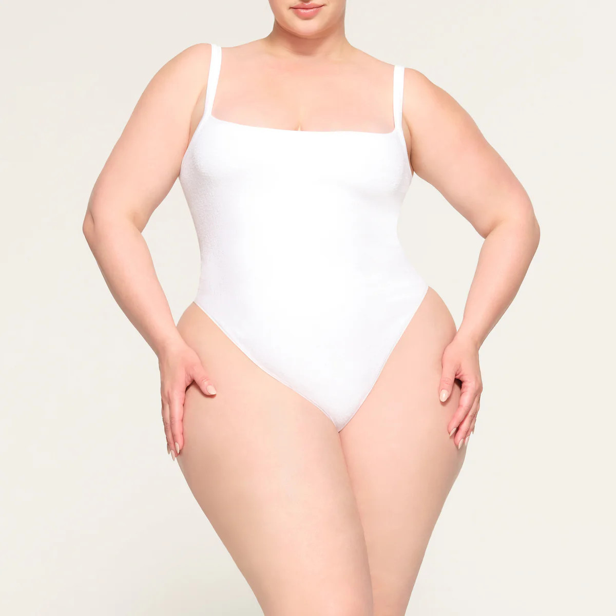 TERRY LOUNGE SEAMLESS BODYSUIT | SKIMS (US)