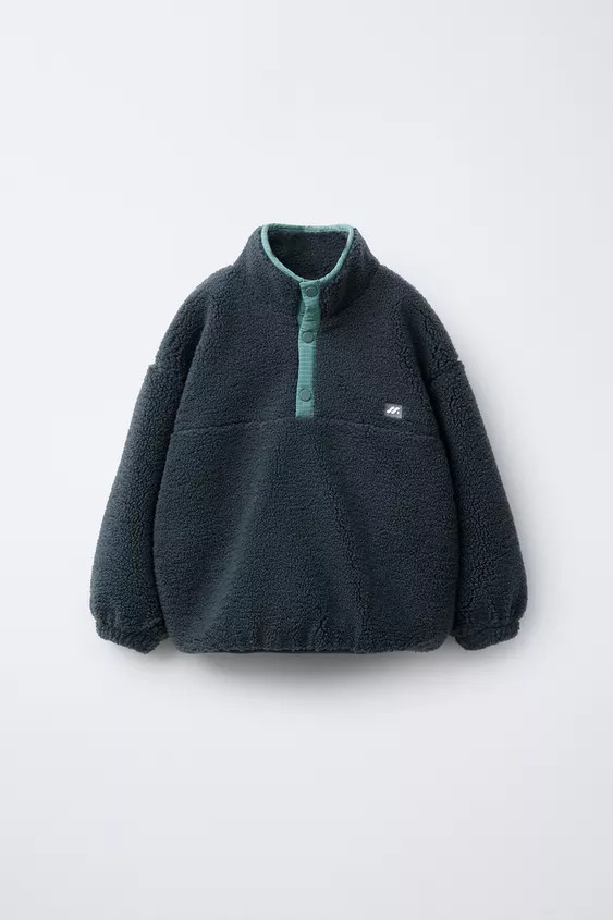 FAUX SHEARLING SWEATER WITH RUBBERIZED LOGO | Zara US