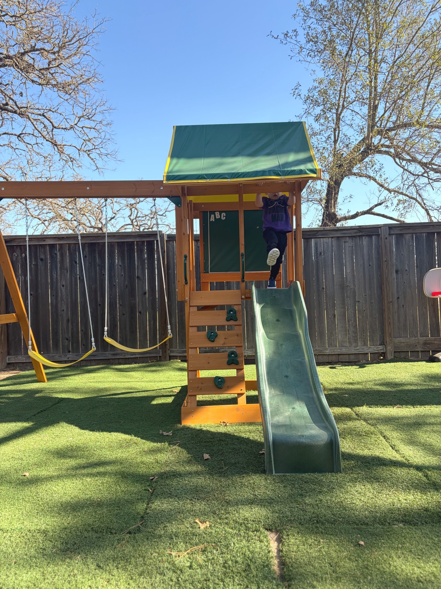 Sensory play for toddlers doesn't have to be messy or complicated! ✨
If you're looking for ways to encourage gross motor skills and creative play in a small backyard, the KidKraft Appleton Wooden Swing Set is a total amazing. We love how it transforms a compact space into a full outdoor sensory station.

Our Favorite Sensory Features:
• The Chalk Wall: Perfect for working on fine motor skills and vertical drawing (which is so great for shoulder stability!). 🖍️
• The Sandbox Base: We converted the lower shaded area into a DIY sandbox. It stays cool in the summer and provides hours of tactile play. 🏖️
• The Rock Wall: A fun way to build confidence and coordination through climbing.
This cedar wood playset fits in just 80 sq. ft., making it the perfect small yard solution for toddlers and big kids alike. It's sturdy, functional, and actually looks so good! 

#LTKkids #LTKhome #LTKfamily #LTKseasonal #smallbackyardideas #sensoryplayideas #woodenswingset #outdoorplayarea #montessoriathome