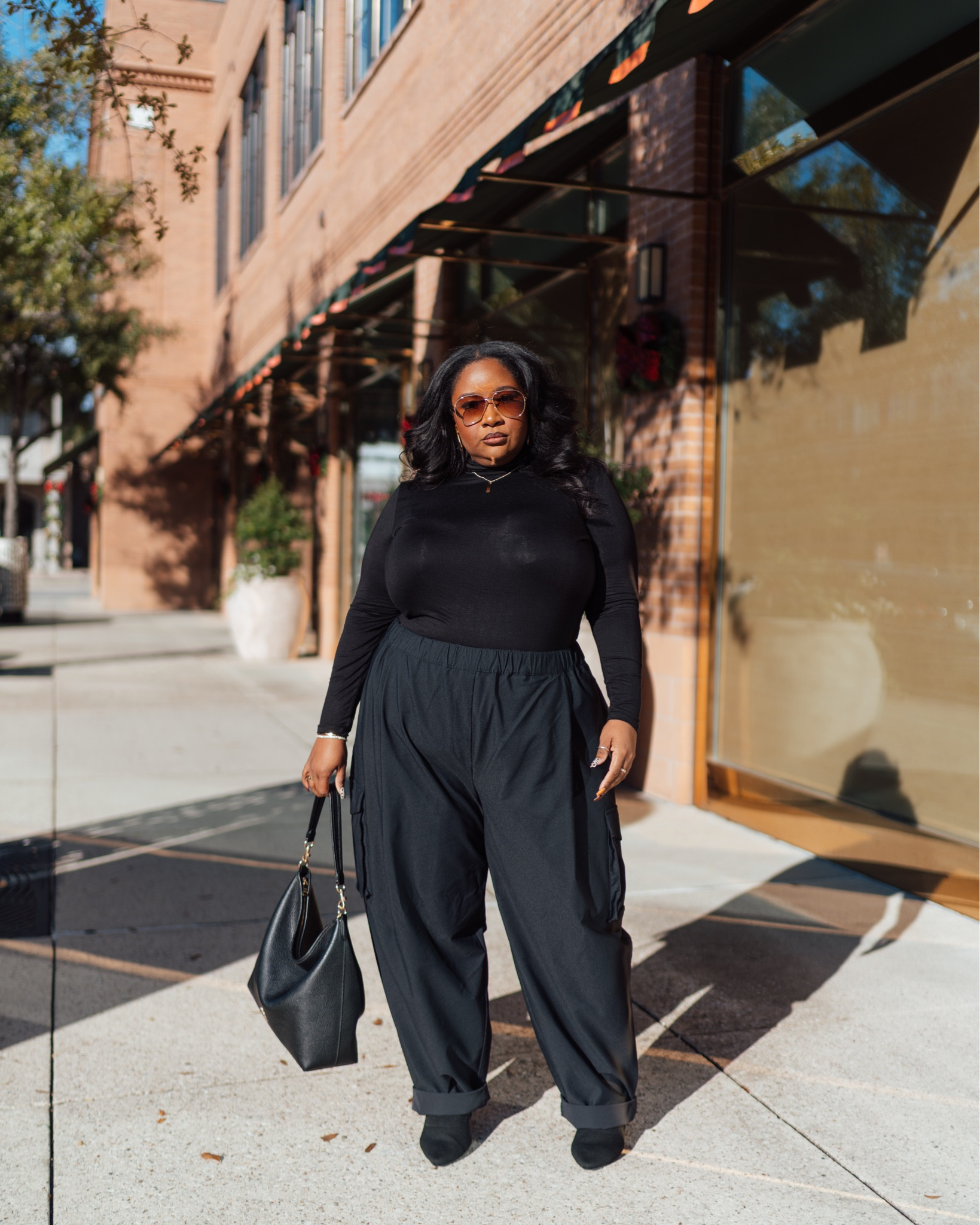 ✨Plus size winter outfit idea!

✨Eloquii black turtleneck runs true to size (tts) 

✨Wearing the JCPenney wide leg cargo pants in a 22 (needed to size down & pants run large) 

✨Laurel large coach bag and black booties for the accessories. I will link similar booties!

Plus size fashion. Outfit ideas. Winter outfits. Plus size winter style. All black outfit.  Wide width boots. 

#LTKootd #LTKPlusSize #LTKgrwm
