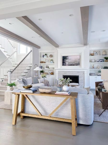 Love this console table behind our couch! Linked all our other living room furniture and decor as well! 

(5/10)

#LTKHome #LTKStyleTip