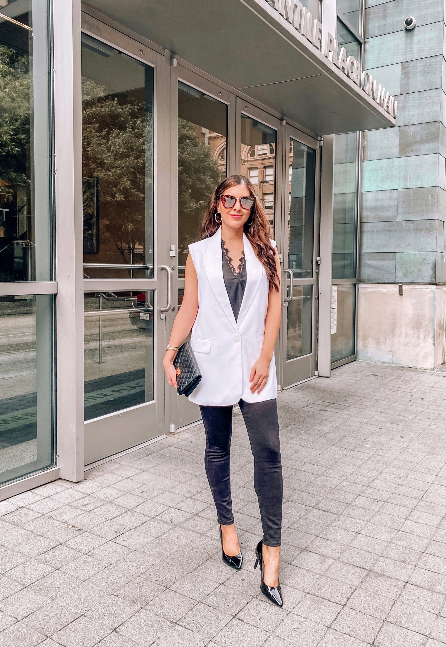 Classic outfit! This outfit is such a chic style and perfect for dinner out and date night. Love this blazer vest on sale 20% off. Paired with this lace top and high waisted black jeans. Wearing XS in the blazer vest and top. Wearing size 27 in the jeans. 



#LTKworkwear #LTKFind #LTKunder100
