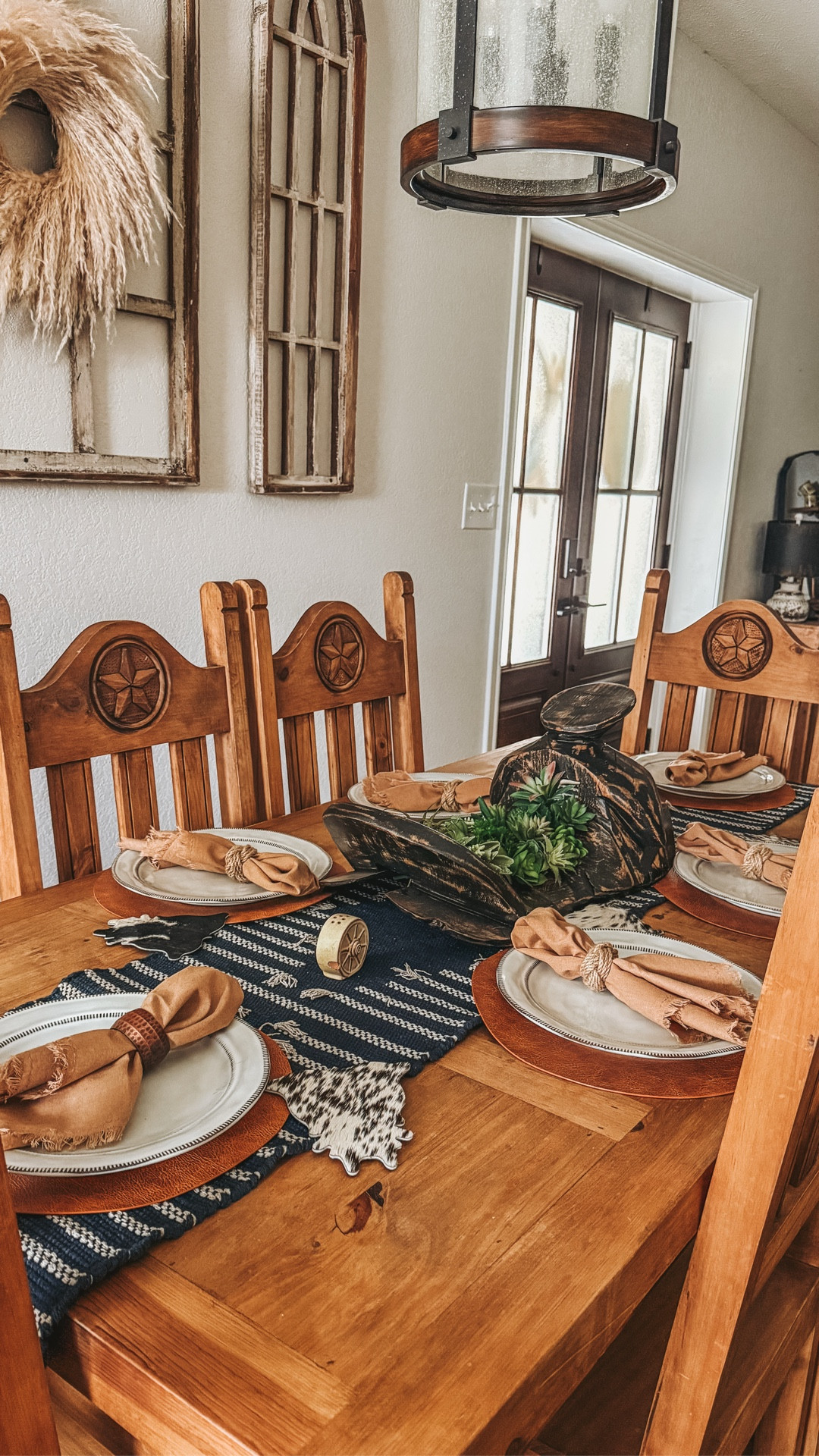 Redecorate our dining room table with me, western edition! 🤠🖤 this was much needed. Will we ever have people over to actually sit, enjoy the new decor, and have a “formal dinner”, probably not 🤣 but it makes me happy and it was fun to do some decorating! #westernhome #westerndecor #westernkitchen #barndominiumliving #decoratewithme 

#LTKvlog #LTKSeasonal #LTKHome
