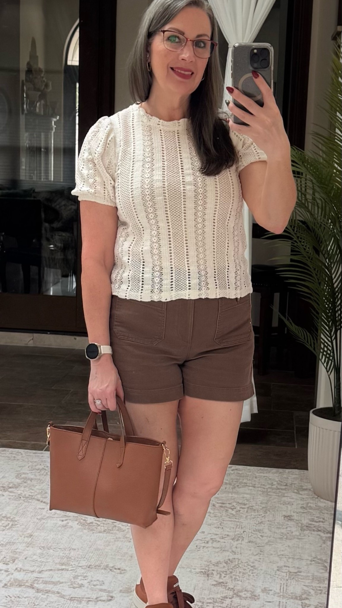 This top was too pretty to pass up. 🤍

Another LOFT find that gives an everyday outfit just a little something extra. I love the feminine lace detail and slightly puffed sleeve—it feels polished without feeling dressy. I recommend grabbing a Cami to wear underneath it. ￼

I paired it with my favorite brown LOFT shorts, a warm cognac bag and my Adidas Grand Court sneakers. 👟🤎 I’ve already told you how much I love these sneakers—this is pair #3 for me!

I especially love mixing a romantic top with casual pieces like shorts and sneakers. It keeps the whole look relaxed while still feeling pulled together.

Almost everything I’m wearing is from LOFT, and I’ve tagged the outfit along with my Adidas. 🤍

#LTKStyleTip #LTKOver40 #LTKSeasonal #LOFTStyle #AdidasStyle #CasualStyle #PetiteStyle