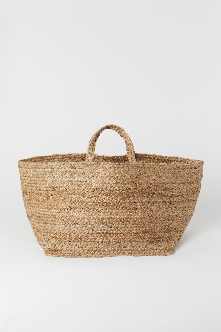 Rectangular jute storage basket with a handle at top. Foldable. Size 10 3/4 11 x 15 in. | H&M (US + CA)