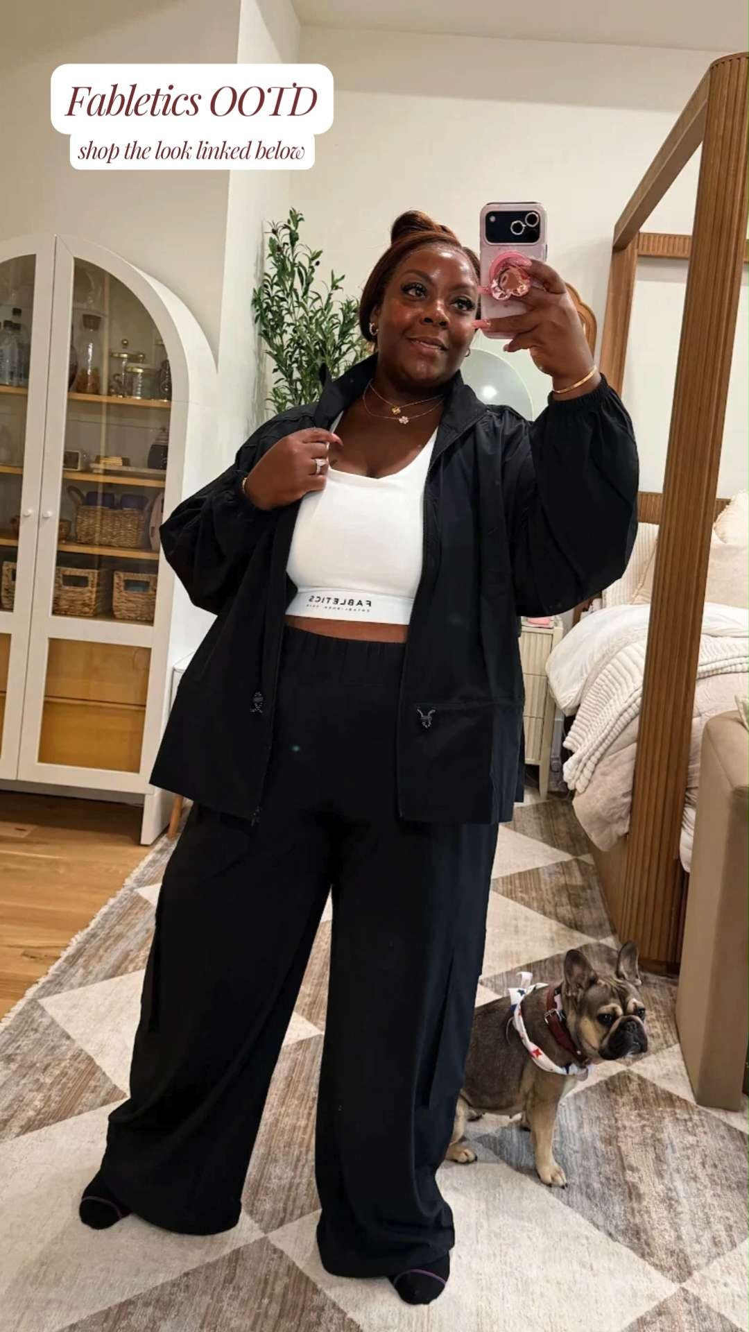 Serving a sporty, chic vibe for today's Fabletics OOTD! 🖤✨ I am loving this black jacket and wide-leg cargo pant set paired with a classic white sports bra. It is the absolute perfect combination of comfort and style for running errands, working out, or just lounging at home with my favorite little helper! 🐾🐶



You can shop this exact activewear look and check out my other fitness favorites linked below! 🛍️



Follow for more @OPERATION_NIKI on IG, TikTok, & Facebook

#Fabletics #FableticsOOTD #Activewear #PlusSizeActivewear #CurvyFitness #SportyChic #LoungeWear #ComfyOutfit #FrenchBulldog #LTKFit #MirrorSelfie #AthleisureStyle 

 #LTKActive #LTKMidsize #LTKPlusSize