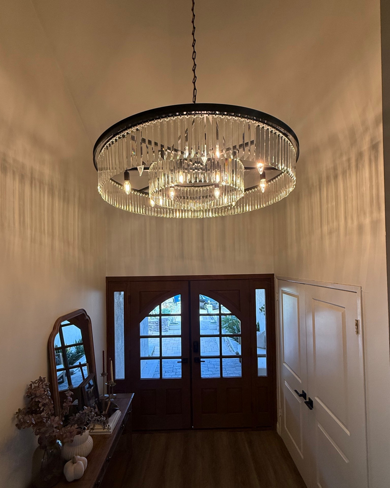 ✨ Entryway glow up ✨ Nothing transforms a home quite like the right modern chandelier. This round crystal chandelier brings the perfect mix of classic elegance and modern lighting to my entryway. It’s a statement piece that instantly elevates your foyer design while creating a warm, inviting welcome.

If you’re looking for the perfect foyer chandelier, high ceiling light fixture, or crystal round chandelier that makes your home feel luxe without overpowering your space, this one is a favorite.

Shop my entryway light fixture and similar modern chandeliers for high ceilings below 🤍


#LTKStyleTip #LTKU #LTKHome