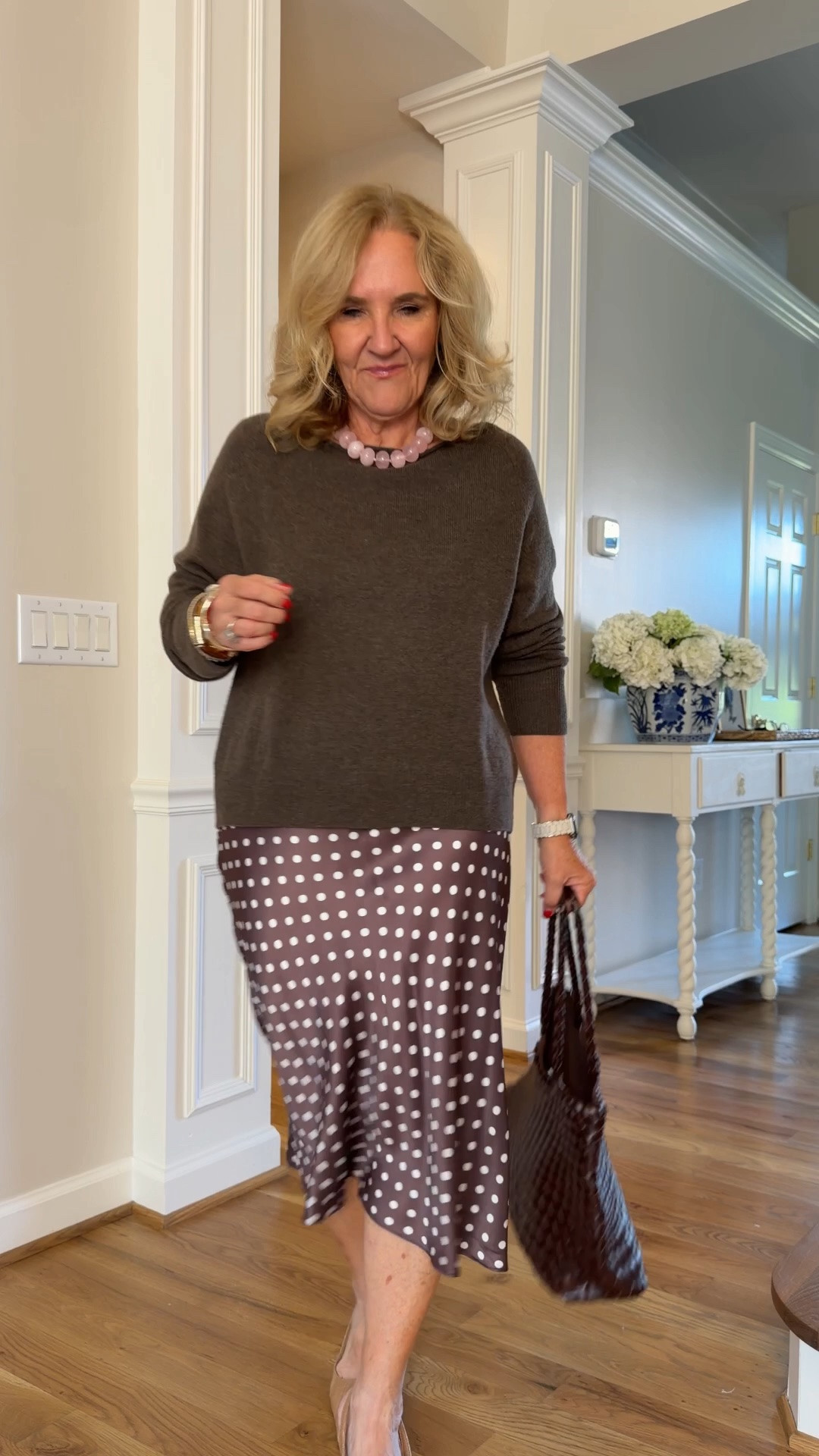 Boone cashmere sweater size medium paired with the silk slip skirt from Quince. There’s many different colors available and depending on the color you choose it could read a lot more dressy even than this. Navy black red green would all be beautiful for holiday or a wedding guest. I love this polkadot for Sundays for showers even with boots for every day.
I get a medium in a sweater and a medium in the skirt
20% off my bracelet stack at Allie & Bess code NANETTE20

#LTKOver40 #LTKWorkwear #LTKWedding