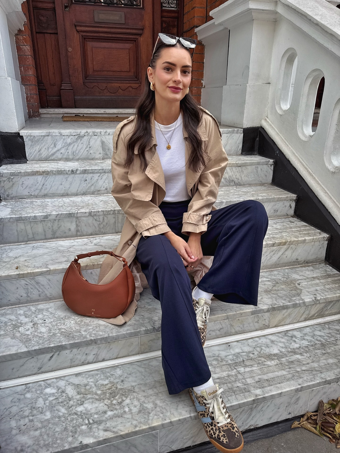 Autumn style, simple outfit idea for fall 🍂

Trench coat, white T-shirt, navy wide leg trousers, leopard print Gola x Anthropologie trainers, brown shoulder bag, gold jewellery and sunglasses

#LTKautumn #LTKuk