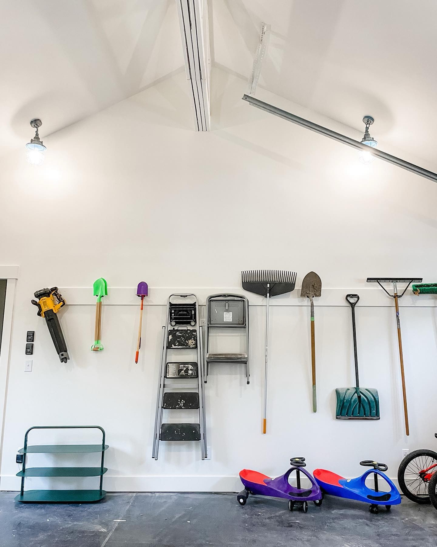 Let’s continue this garage party! 🎉 
⠀⠀⠀⠀⠀⠀⠀⠀⠀
The final wall from this wild garage transformation is home to all yard tools and a gorgeous shoe rack from @getopenspaces (check out yesterdays post if you missed the rest of the space)! 
⠀⠀⠀⠀⠀⠀⠀⠀⠀
Spring is the perfect time to get your garage organized for the busy summer season (and the cooler temps certainly make it easier to execute these projects for our team)!
⠀⠀⠀⠀⠀⠀⠀⠀⠀
Click the “Book Now” link in our profile if your garage is in need of some ❤️!