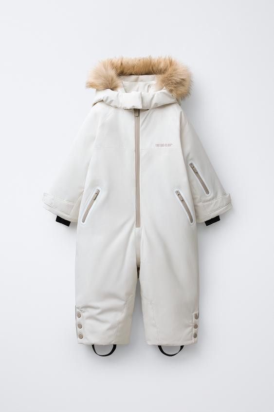WATER RESISTANT AND WINDPROOF RECCO® SYSTEM SKI COLLECTION LONG JUMPSUIT WITH FAUX FUR HOODIE | Zara US