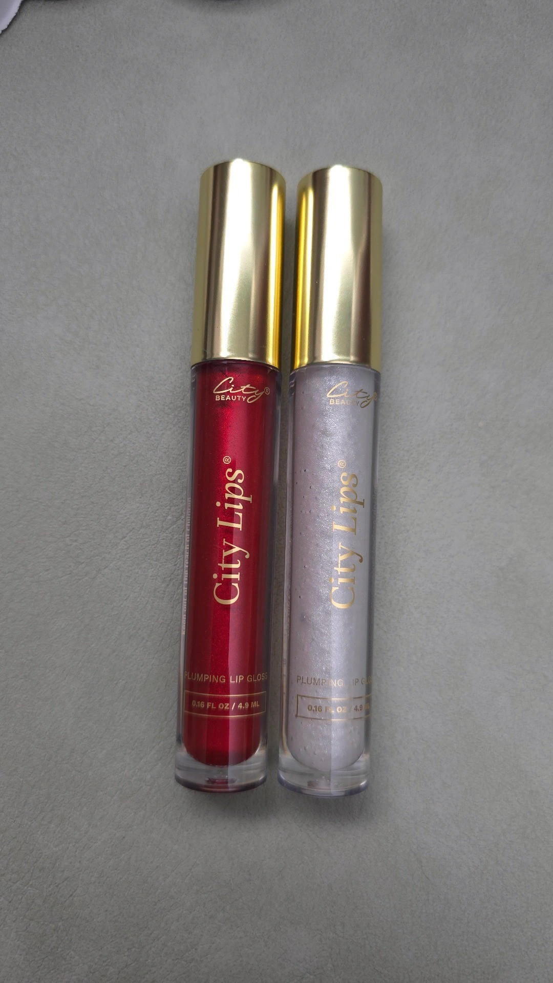 SALE ALERT! City Beauty just released two new holiday lip gloss shades 💋 Holly is a warm-based red with a sparkly finish (limited time only) and Silver Skyline is a sheer shimmer with silver glitter. Use BRYNN15 for 15% off sitewide! 

#LTKHoliday #LTKSaleAlert #LTKFindsUnder50