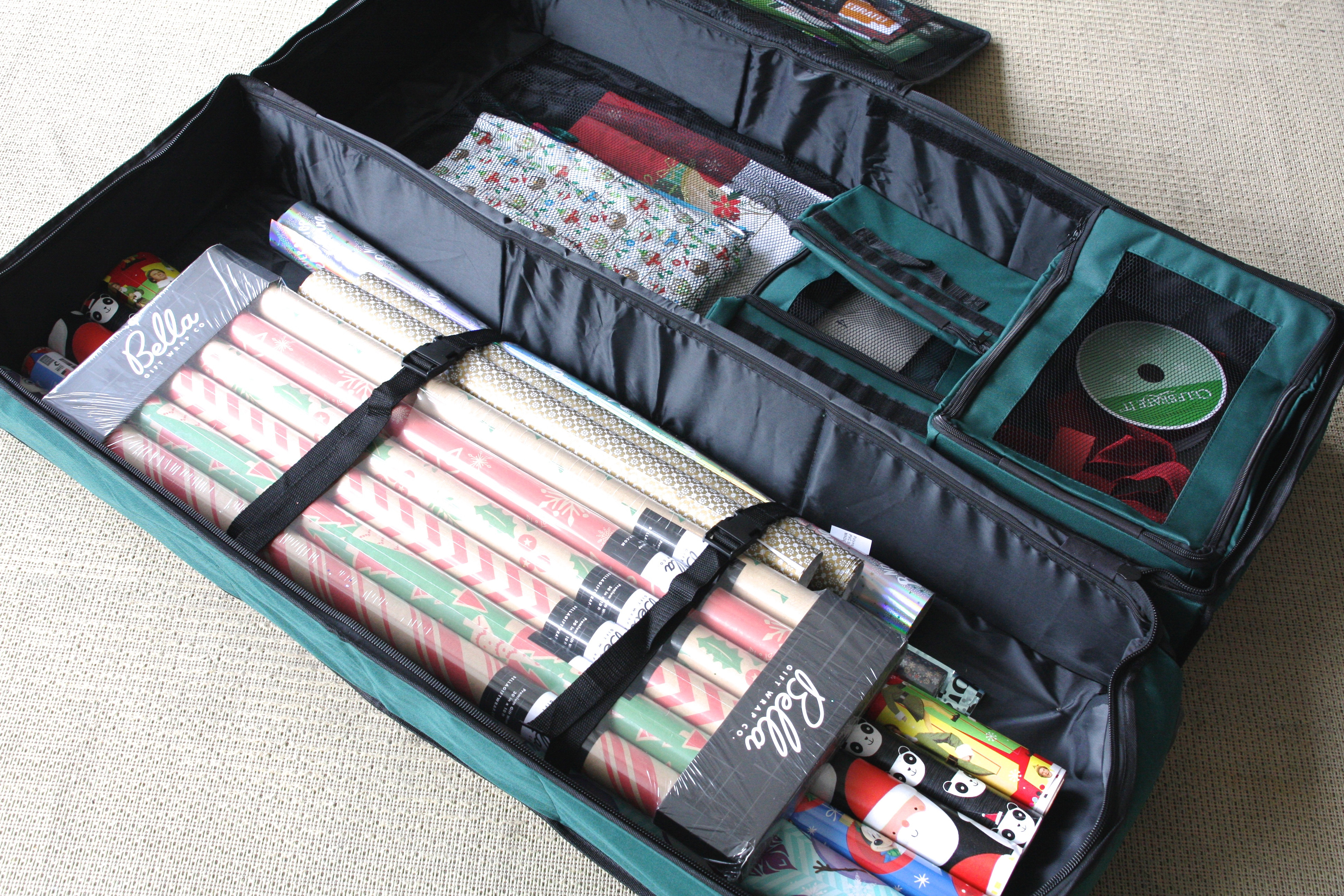 Since we only use Christmas wrap for 1 month out of the year, I like to store it away with the Christmas decorations. A storage bin like this keeps everything clean, wrinkle free AND gives you open space to store year-round gift wrap you are grabbing for every other month. I love these! 

 #LTKHoliday #LTKSeasonal #LTKSaleAlert