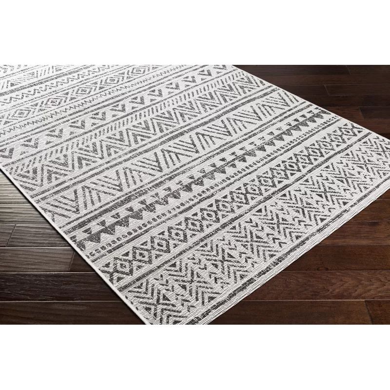 Junie Machine Woven / Power Loomed Black/Off-White Indoor/Outdoor Rug | Wayfair North America