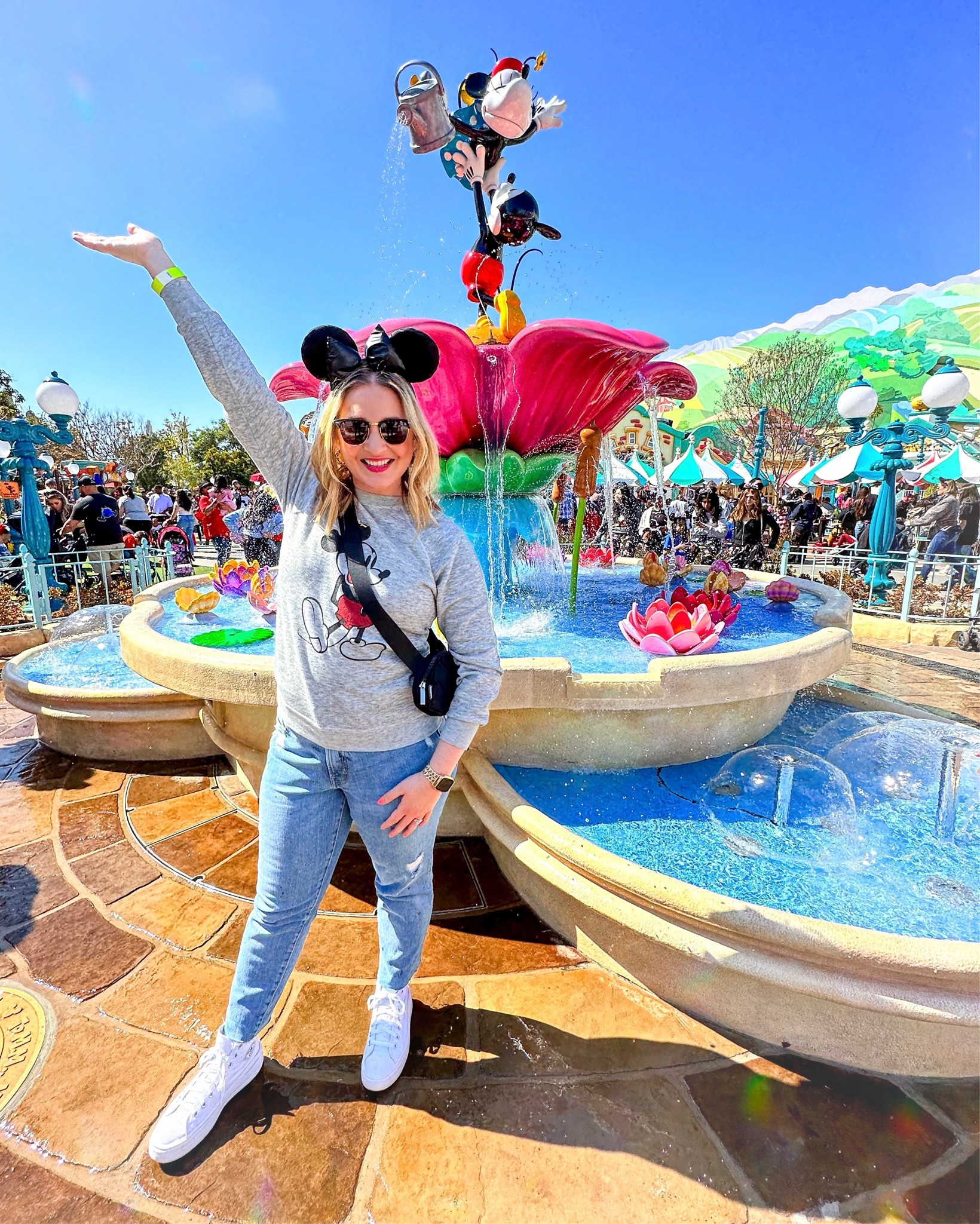 We checked out the new Toontown at Disneyland! This classic Mickey Mouse sweatshirt was perfect for the beautiful spring weather. Paired with my black Minnie ears, Lululemon belt bag, and my platform converse. Spring Disney outfits and summer Disney outfits are coming your way! 

#LTKSeasonal #LTKstyletip #LTKunder100