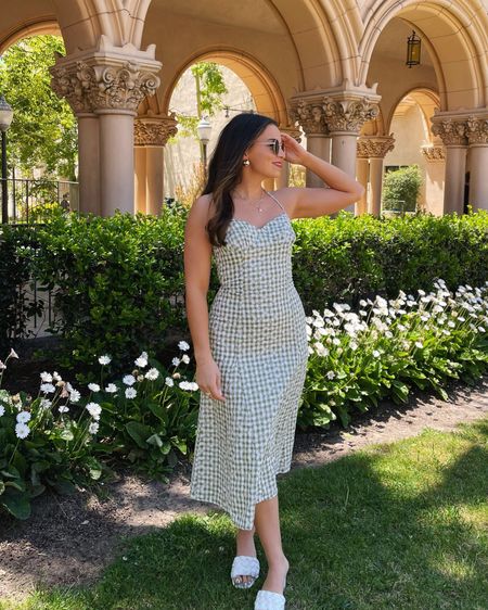 Green gingham dress from Lulus 💚 Wearing XS, could have done S for a more comfortable fit!

Lulus dress, green gingham dress, halter dress, halter midi dress, spring dress, summer dress, white sandal heels, block heels, chunky block heel, vacation heels, bridal shower heels, round sunglasses, spring outfit

#LTKSeasonal #LTKtravel