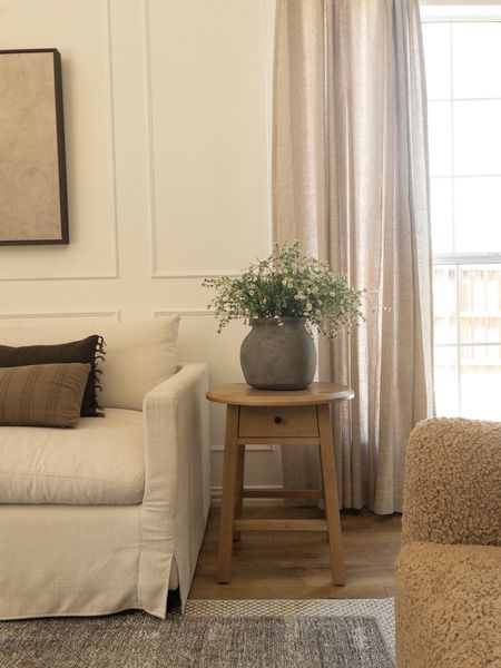 Living room views with this cute side table from Walmart - only $98!

living room inspo, home inspo, side table, affordable furniture, affordable side table, affordable finds, Walmart finds, couch, slipcover couch, boucle chairs, art, pinch pleat curtains, spring stems, vase, rug, living room styling 

#LTKhome #LTKstyletip