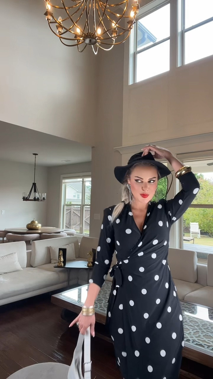 
Anne Klein Women's Long Sleeve Polka Dot Jersey Wrap Dress

The cut of the dress and the polka dots, balanced with simple accessories, elevate elegance to the next level.

Details: V-neck, belted waist, above-the-knee pieces, classic black-and-white contrast.

For everyday chic, accessorize with a small bag and a bathrobe.

Polka dot elegance meets the spirit of a beautiful woman. Make a statement with this dress.

Elegance is achieved with minimal touches: A polka dot dress preserves your elegance at its most beautiful.

Will the shine last? This dress and this song bring back the most beautiful tone of memories.

- #PolkaDotDress
- #BeautifulWomen
- #Elegance
- #ClassicElegance
- #FashionTrends
- #DressStyle
- #WinterSummerDifference (seasonal set)
- #StyleTips
- #Women'sBeauty
- #CombinationTips
- #FashionBlog
- #OOTD (Outfit of the Day)

#LTKStyleTip #LTKActive #LTKHoliday