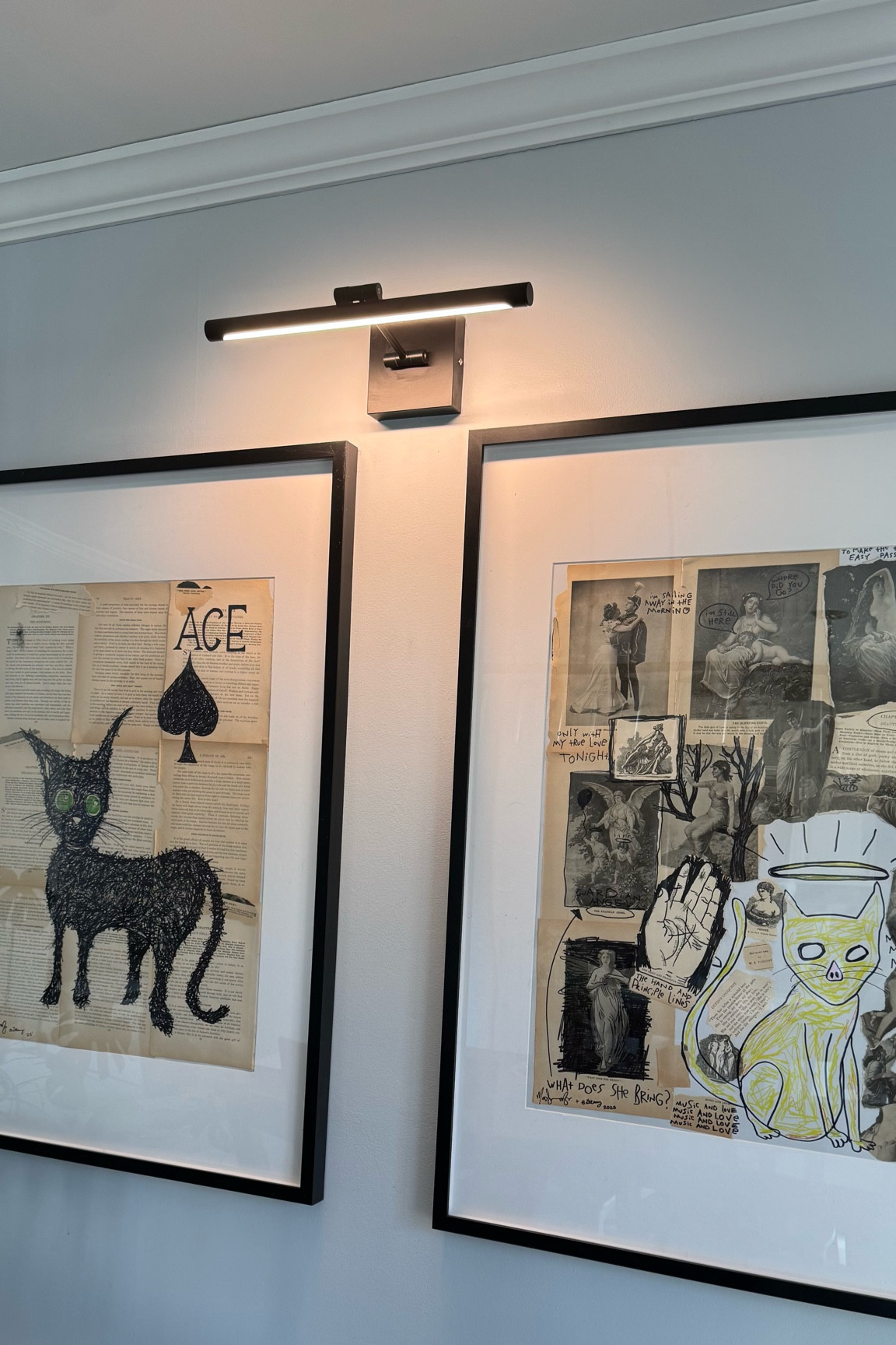 Art display with extra large frames and art display light.  Exact frames are from IKEA- the RÖDALM style size 27 1/2 x 39 1/4 “  

Dining room decor, art gallery, picture frame display, hall way design

#LTKHome #LTKFindsUnder100