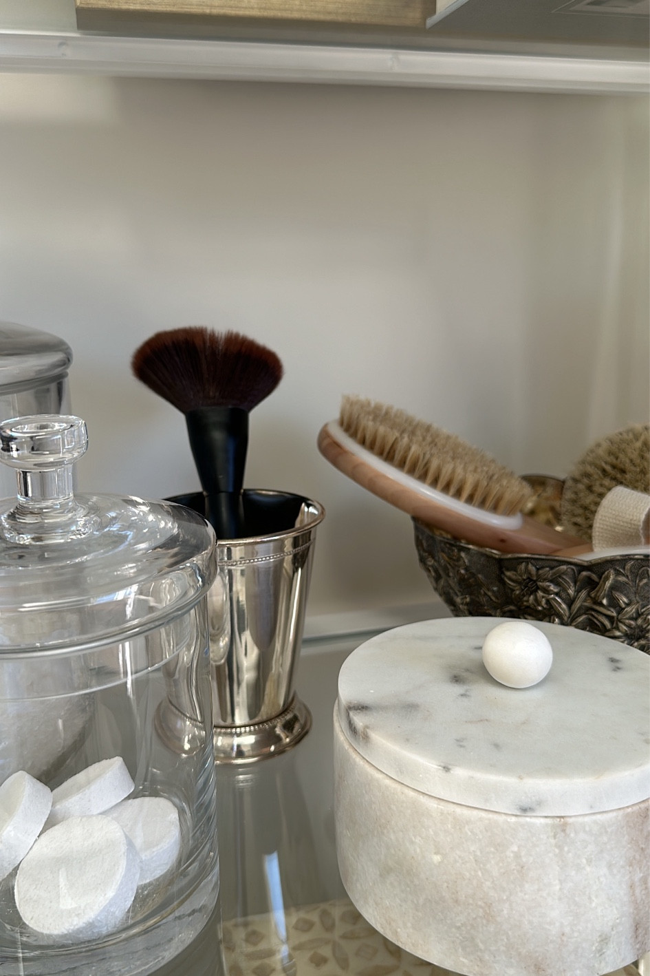 Silver cups used as styling pieces around the house. 
-makeup brushes
-pencil & pens 
-small bouquet of flowers 
🤍

#LTKBeauty #LTKHome #LTKStyleTip