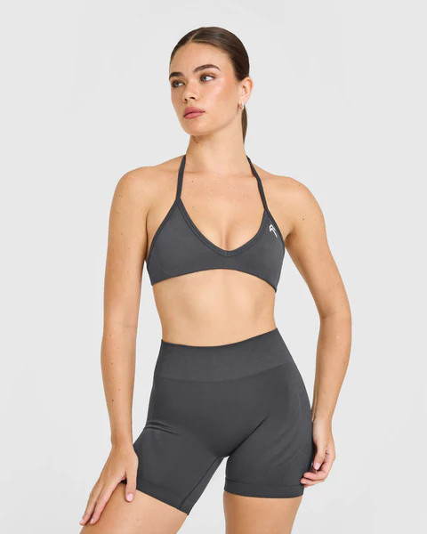 EnhanceLift™ Seamless Minimal Halter Neck Bralette with White Logo 
 Coal | Oner Active (UK / US)