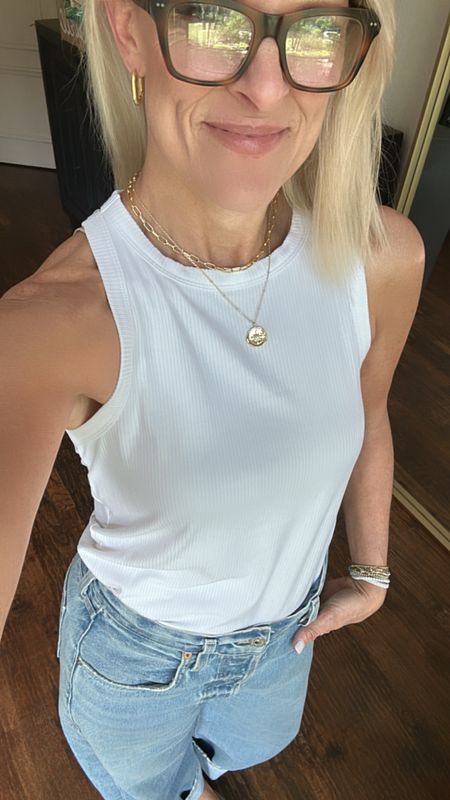 Classic denim and white 

These jeans are baggy and cuffed. I sized down one size 

This tank is worn on repeat in the summers. Goes with everything. I also sized up to a medium in the tank.top 

#LTKStyleTip #LTKFamily #LTKOver40