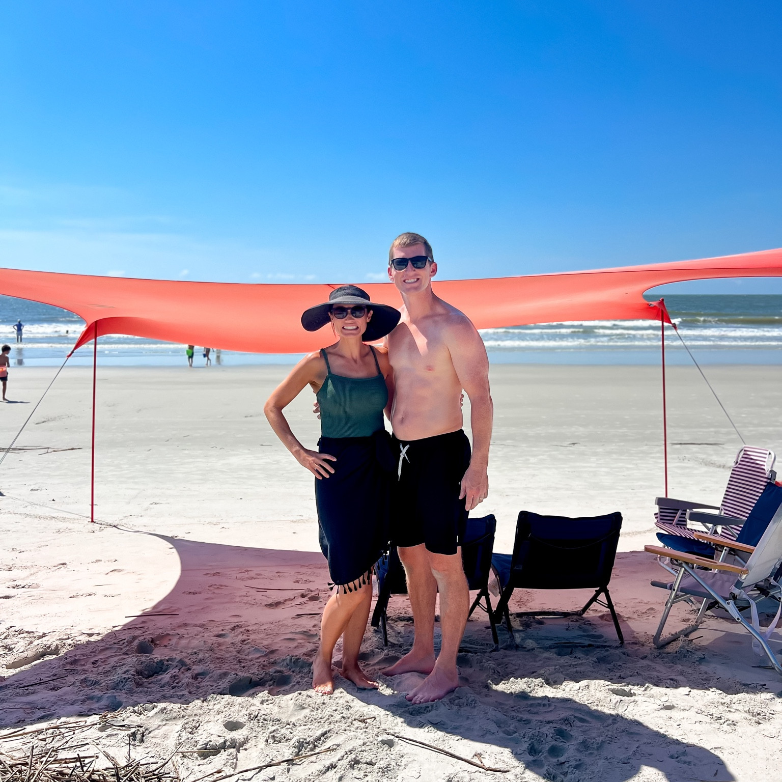 We’ve used this tent for the past 4 years. It is quick and easy to set up and take down and stores in a small bag. We have the large and can fit 14 people under it comfortably.