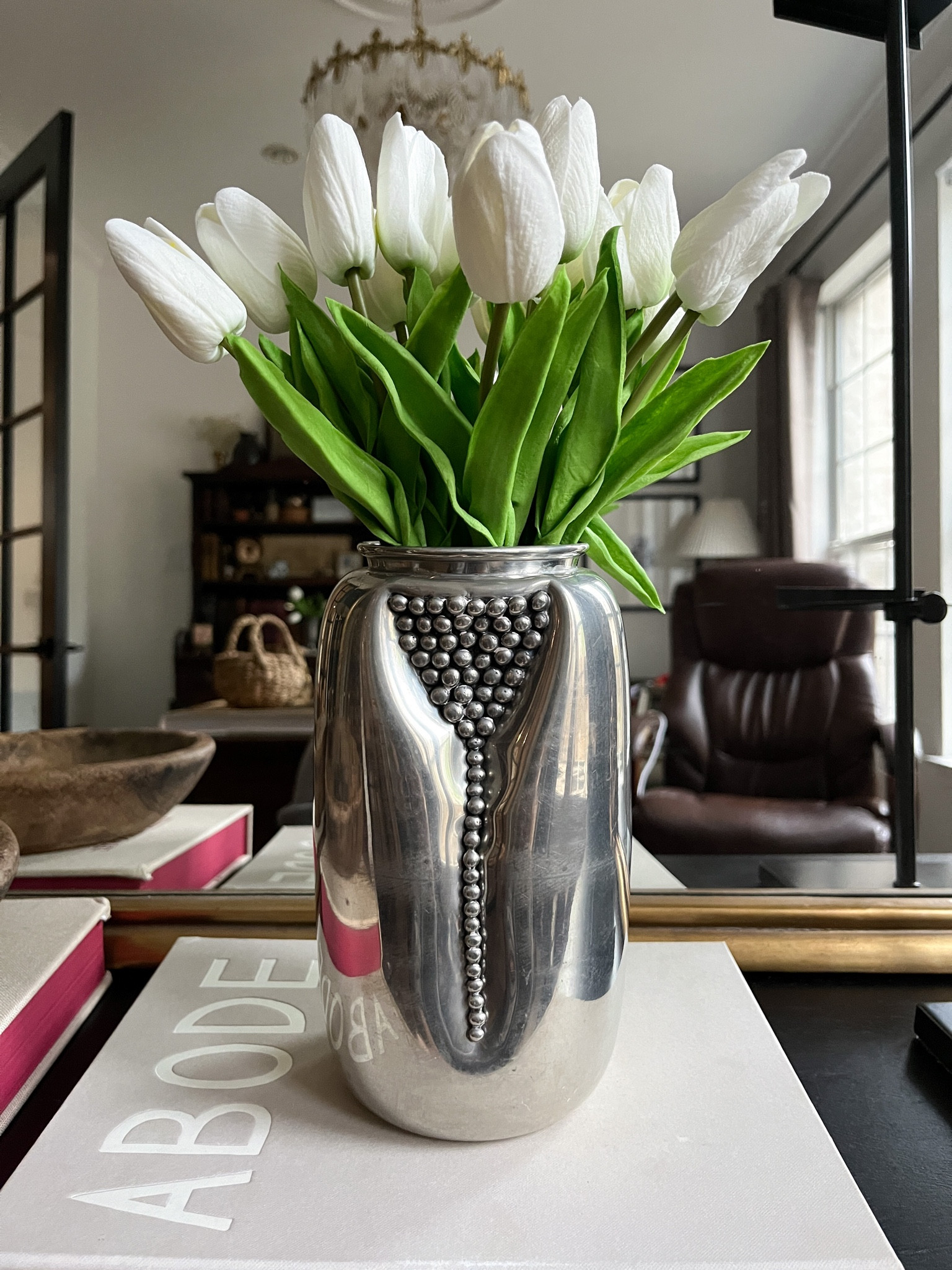 Faux tulips in vintage pewter vase 

#LTKstyletip #LTKSeasonal #LTKhome