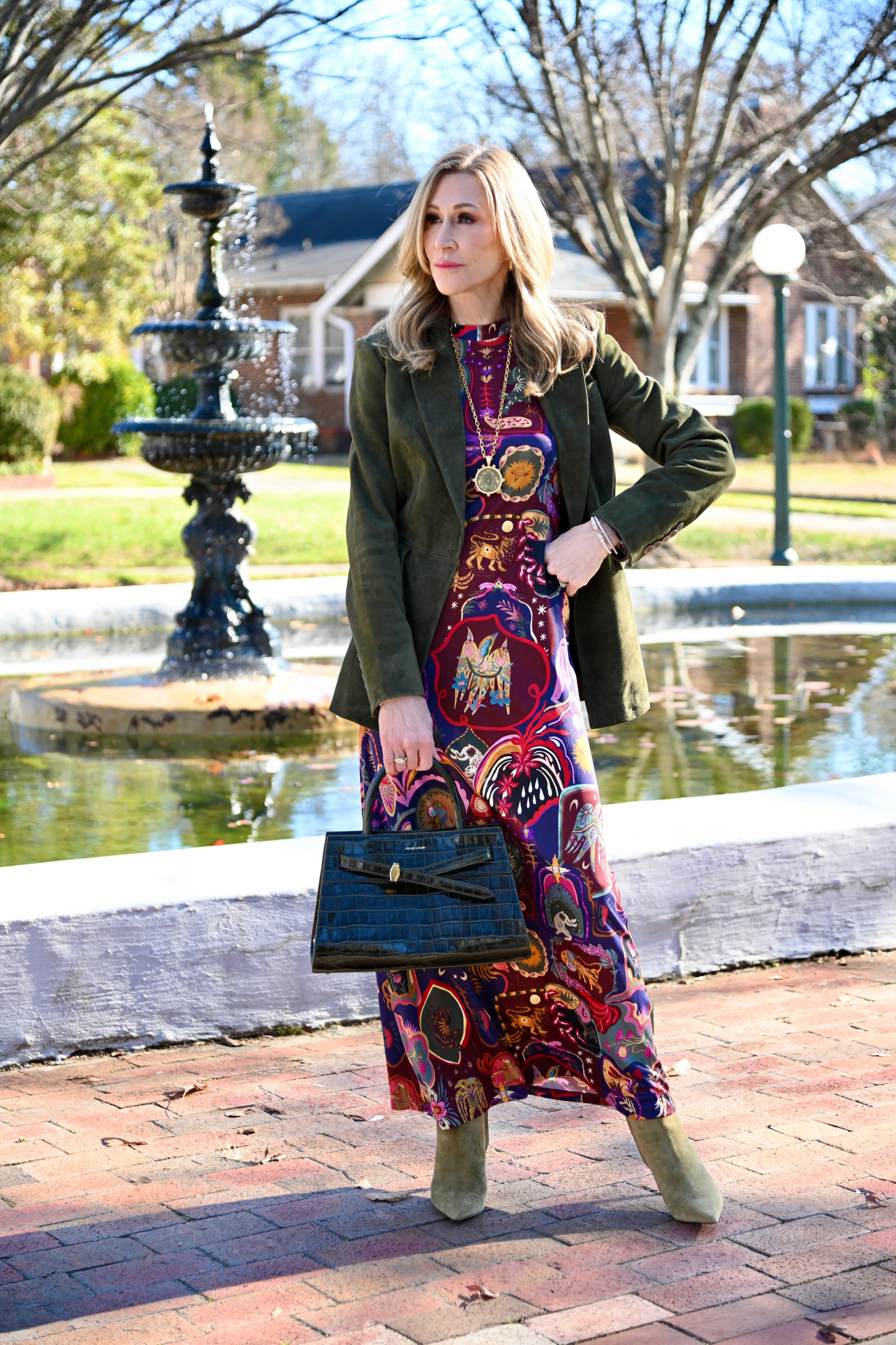 Struggling to get more wear out of your blazers? Let me show you how one piece can work so many different ways 

This green suede Veronica Beard blazer  has already proven itself as one of the most versatile pieces in my closet. Don't be afraid to mix styles that feel different.
Here's what I did: I paired this polished, structured blazer with a vibrant, bohemian Farm Rio maxi dress. The green suede pulls out the earthy tones while adding just enough polish to balance the playful pattern.
My tips for making blazers work harder in your wardrobe:

Mix polished with bohemian—the contrast is what makes it interesting

Look for one standout piece (like this suede texture) that elevates everything

Don't save your "nice" pieces for special occasions—wear them NOW

I styled this same blazer completely differently in another post (link in bio!)—same piece, totally new vibe. That's how you know it's worth the investment. 

 #LTKdayinmylife #LTKSeasonal #LTKOver40