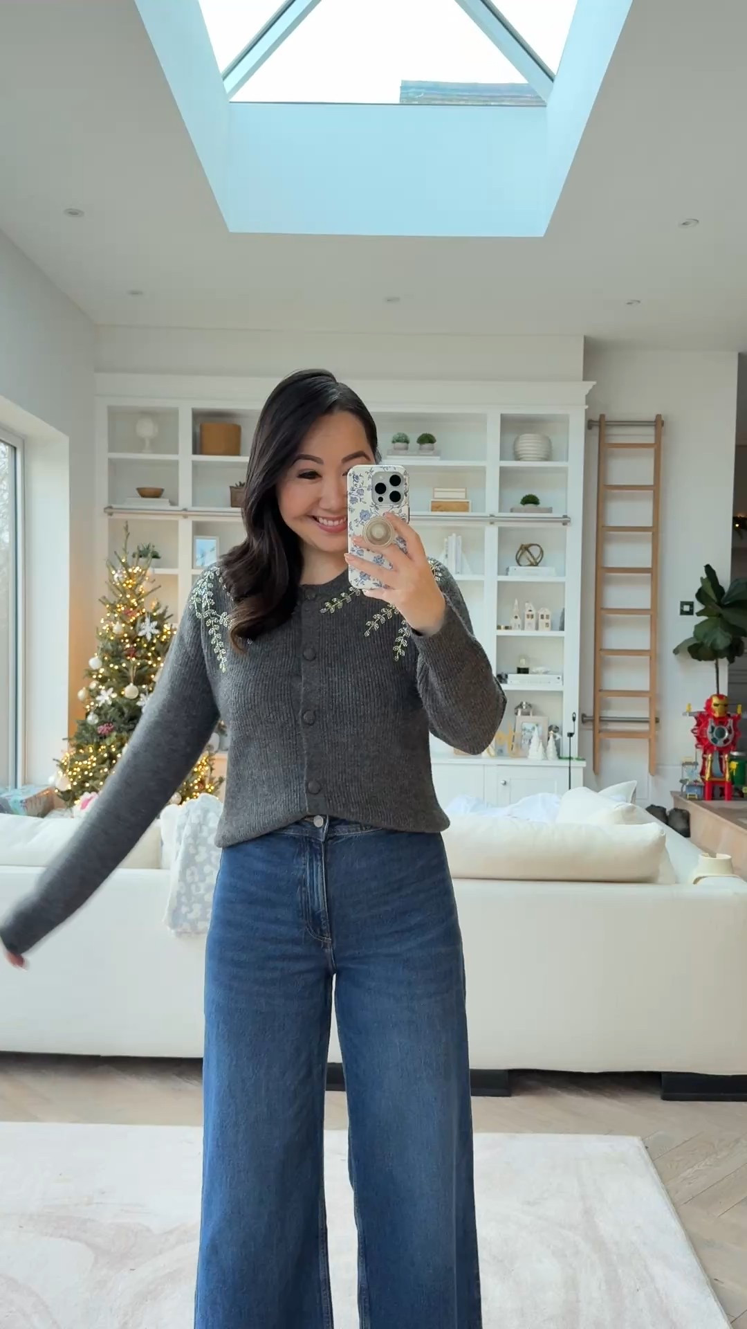 The cutest little festive cardigan! I took a XS